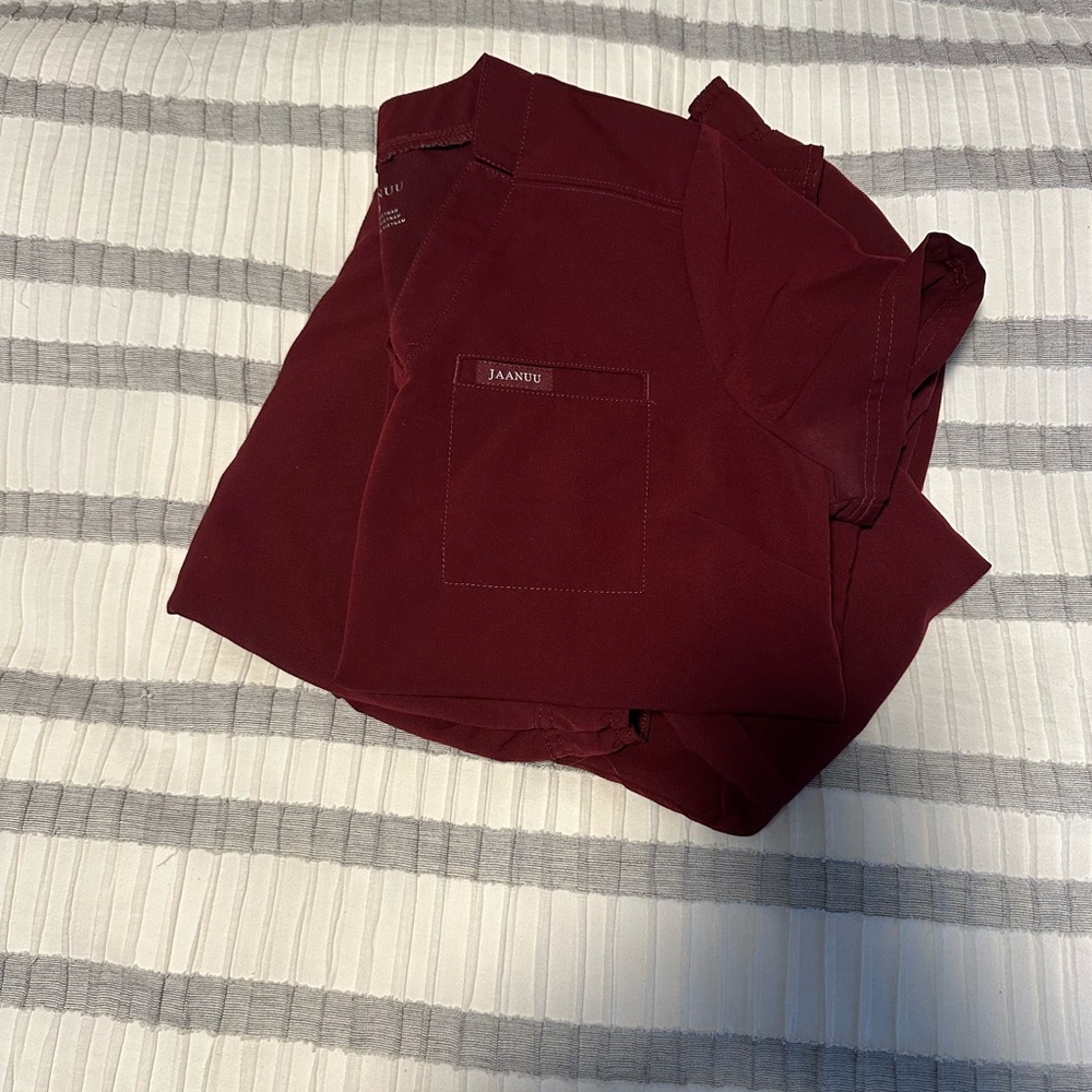 Jaanuu women’s Deep Red Scrub Top and jogger bottoms